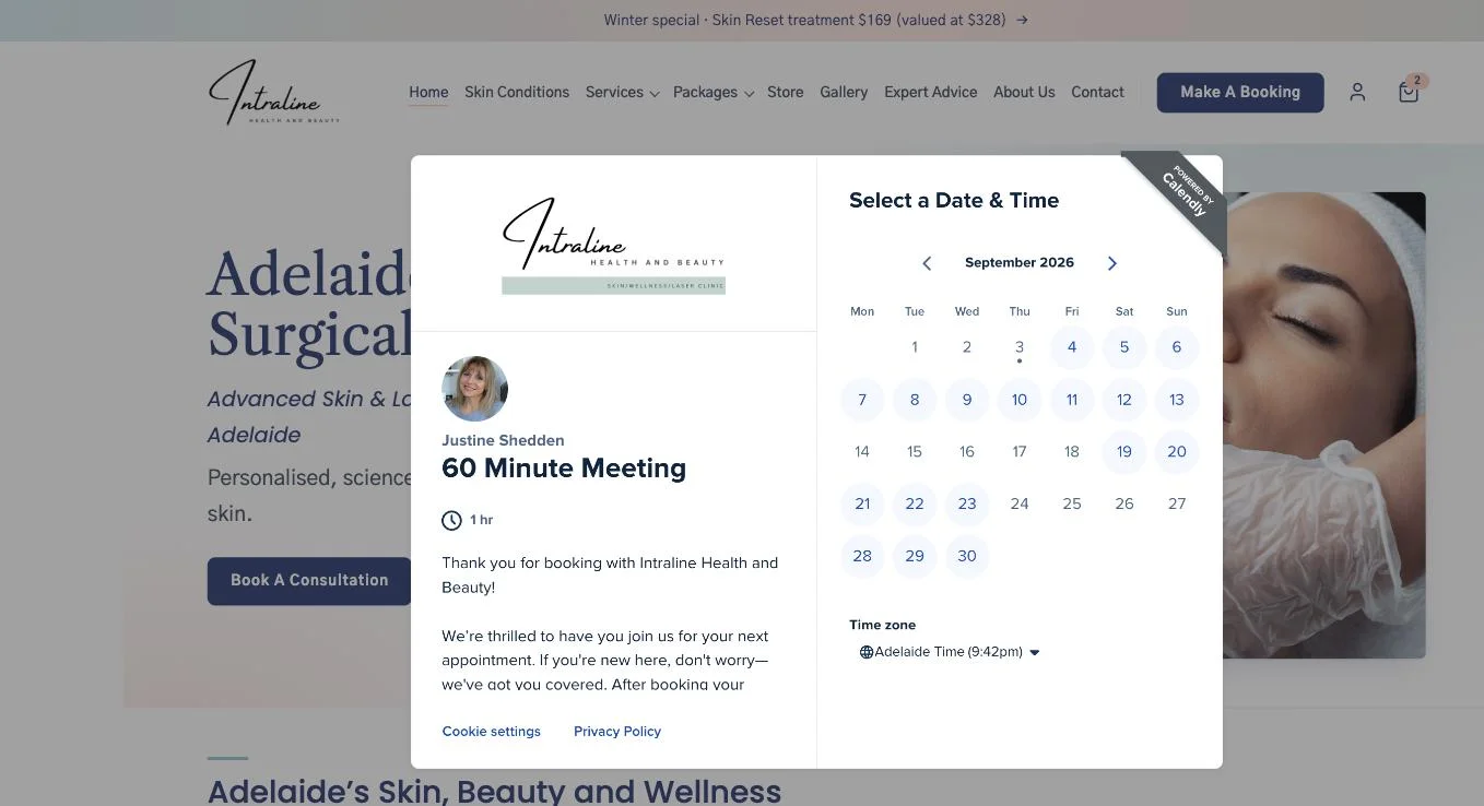 The Calendly booking window open over the Intraline homepage: a 60 minute meeting with Justine and a September calendar of available dates